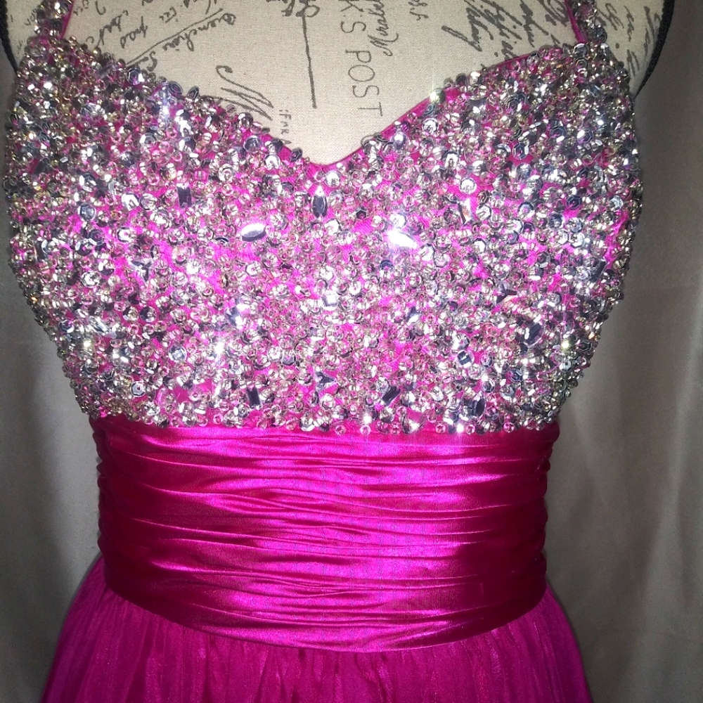 pink sequin bodice long evening gown size 16. The dress is on a wide bias cut.